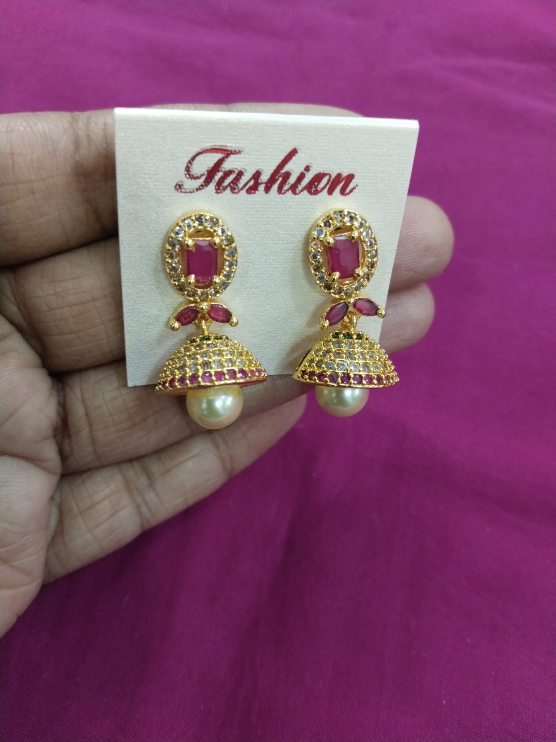 Handcrafted CZ Jhumka Earrings with Floral Design and Pearl Finish