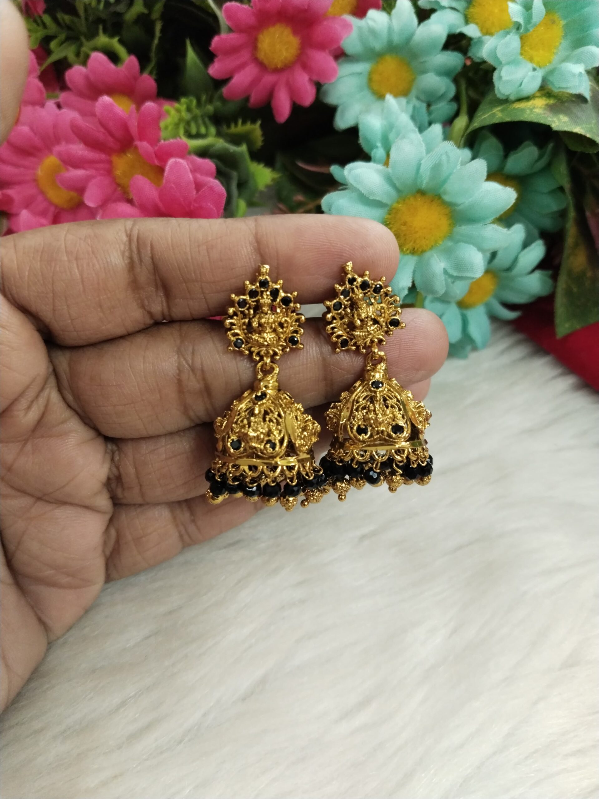 Gold Lakshmi Motif Jhumka Earrings with Black Beads – Traditional Temple Jewelry for Women