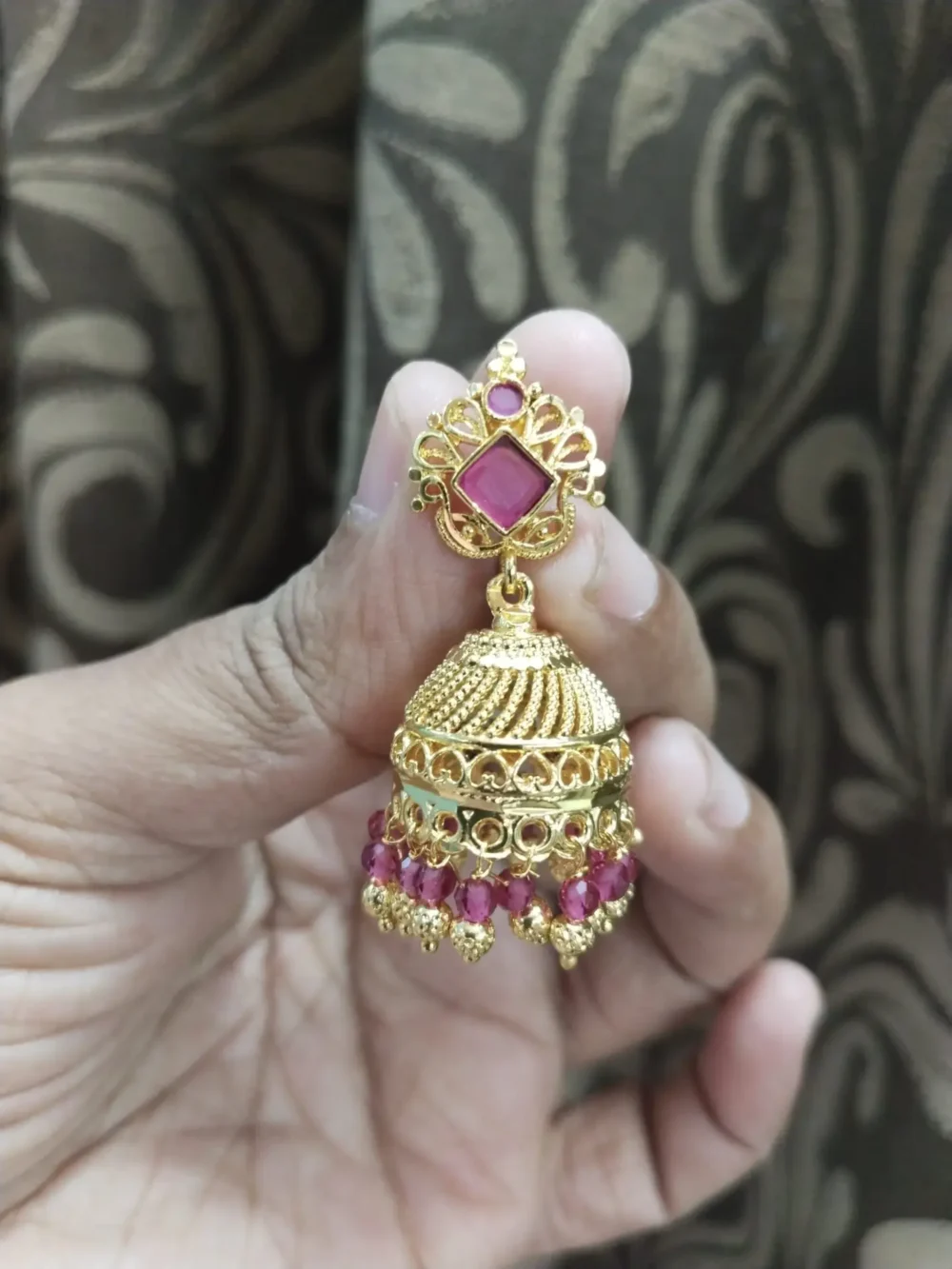 Gold Plated Jhumka Earrings with Pink Beads – Traditional Indian Design | On-Ear View - Image 3