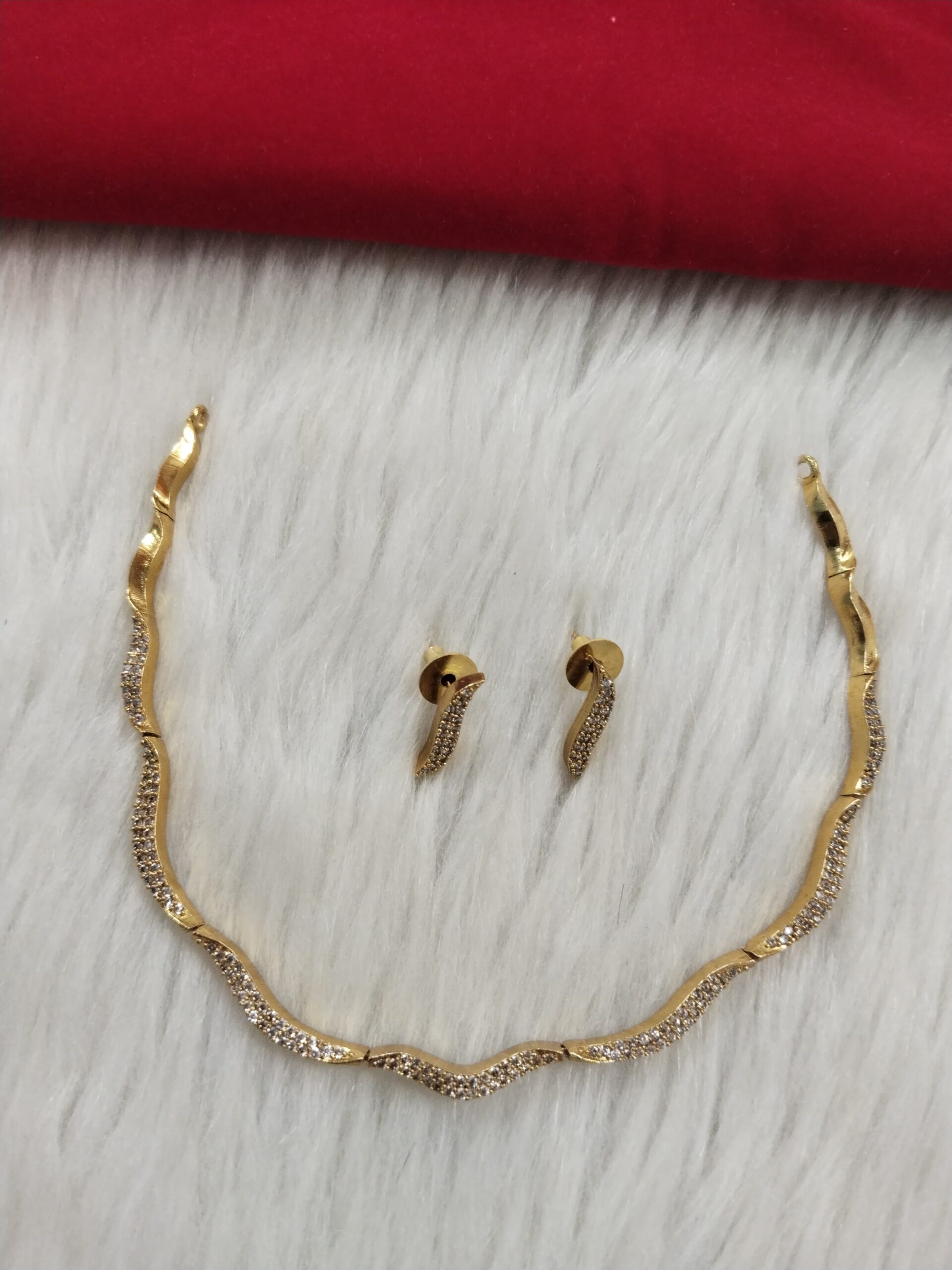 Elegant Gold-Plated Wave Design Necklace and Stud Earrings Set with Cubic Zirconia Stones