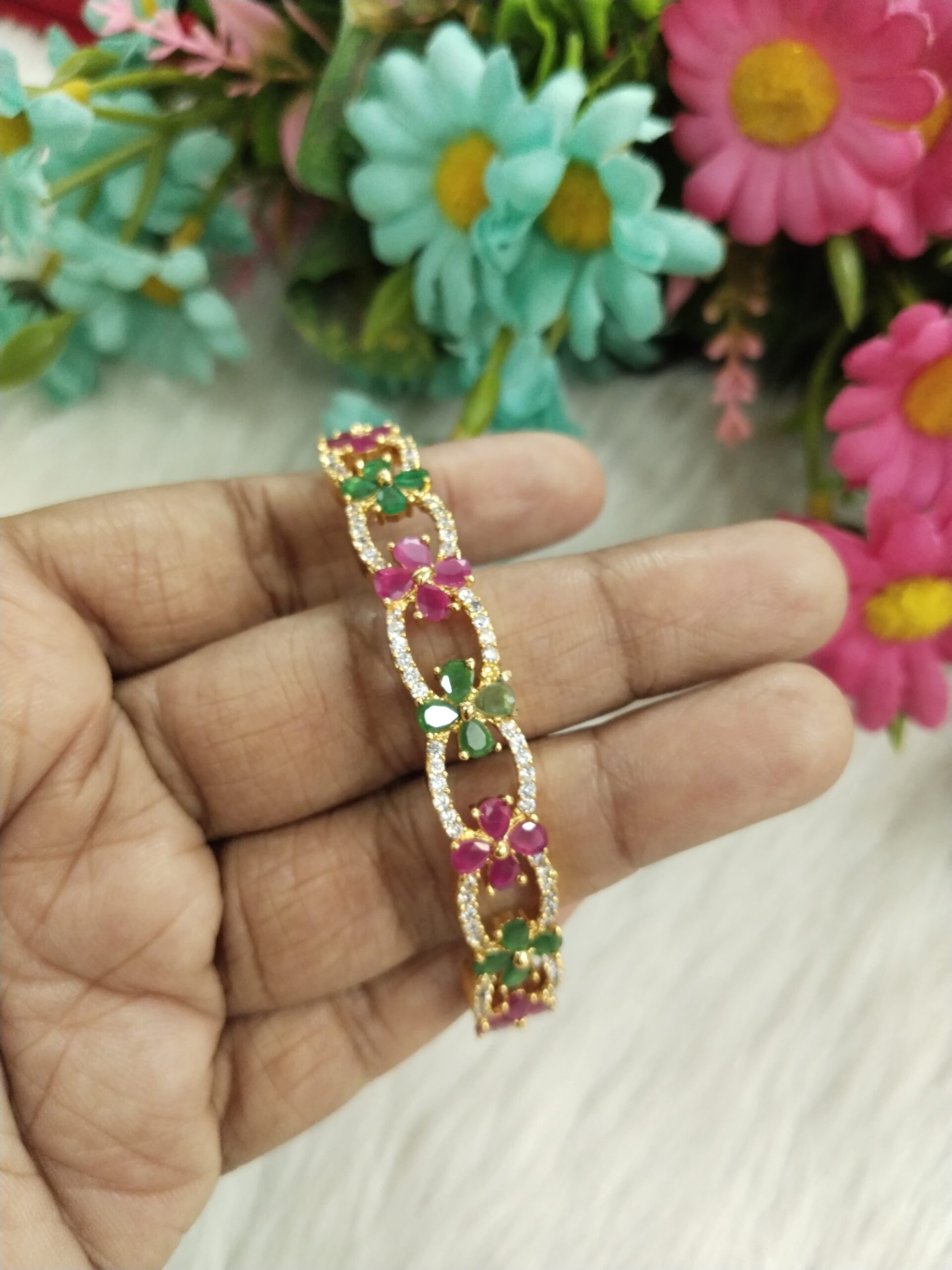 Elegant Floral Design Gold-Plated Bracelet with Ruby & Emerald Stones