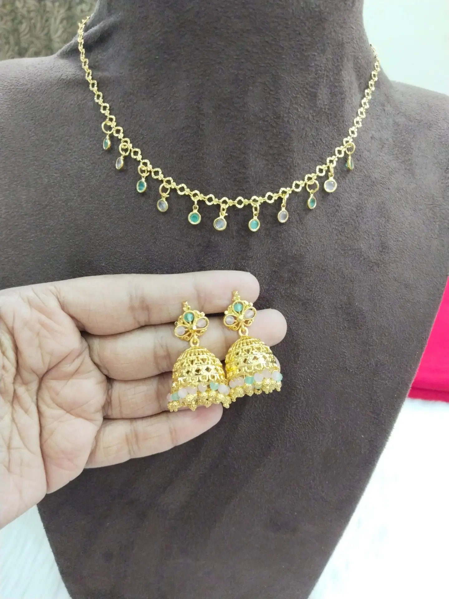 Gold-Plated Necklace and Jhumka Earrings Set with Green and White Stones